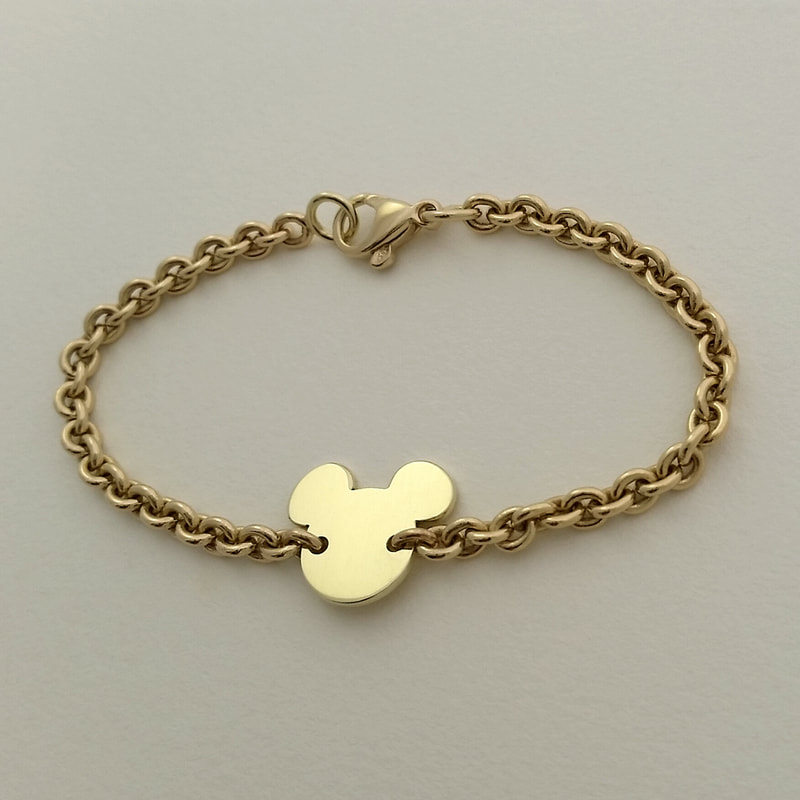 Mickey ovale schakels armband 14K geel goud met mickey silhouet Daphne Meesters Jewellery Ontwerper Designer Edelsmid Goudsmid Den Haag Nederland